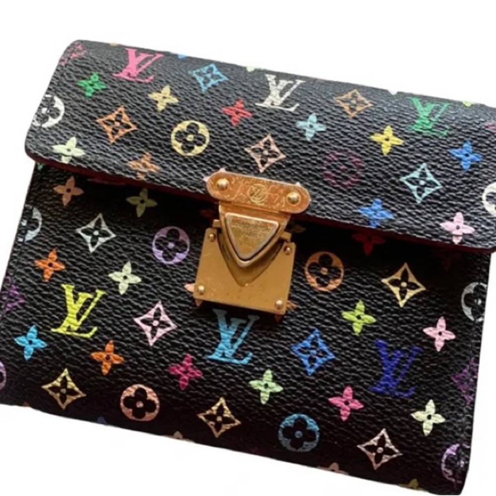 Louis Vuitton Audra Wallet Used but still in great condition. Not box